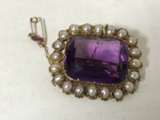 A gold mounted Victorian pearl and amethyst brooch
