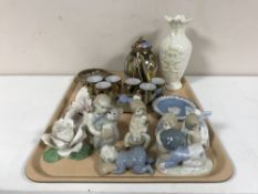 A tray of Belleek vase, miniature oriental eggshell tea service, Spanish figures,