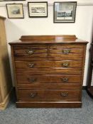 A Victorian walnut chest of five drawers,