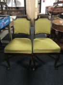 Four continental oak dining chairs