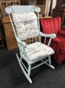 A painted rocking chair