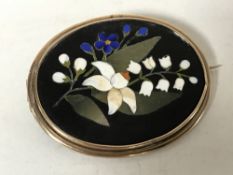 A Victorian pietra dura oval brooch, 46 mm x 37 mm, mounted in gold.