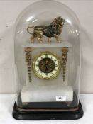 An alabaster and gilt metal mounted mantel clock,
