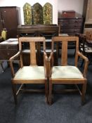 A set of eight oak dining chairs,