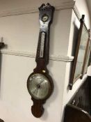 A Victorian mahogany barometer with silvered dial