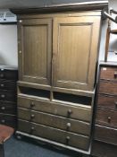 A Victorian oak linen press.