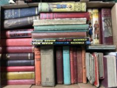 Two boxes of assorted children's books and novels includes film pictorial annuals,