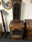 A heavy pine & wrought iron audio cabinet and matching CD stand