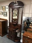 A Victorian style mahogany mirrored hall stand,