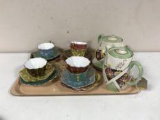 A tray of Tunstall hand painted teapot, coffee pot and stand,
