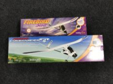 A boxed Fire Bird Scout radio controlled plane and a boxed Fire Commander
