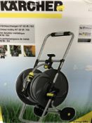 A boxed Karcher hose on reel