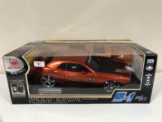 A boxed New Bright remote control Dodge Challenger