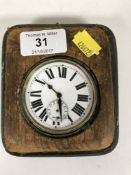 An oversized nickel pocket watch in travel case