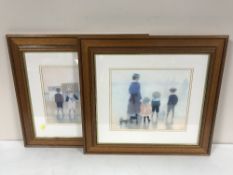 A gilt framed mirror and a pair of framed prints - figures on a beach