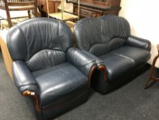 A blue leather two seater settee and swivel armchair