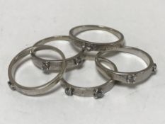 18ct white gold puzzle ring 9 diamonds 8.