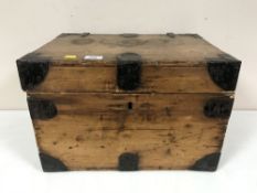 An antique pine metal bound box