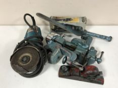 A wooden drawer of assorted hand tools,