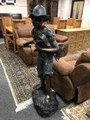 A patinated bronze statue fountain,