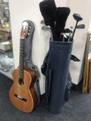 A golf bag containing set of Calculus irons,