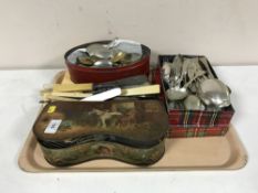 A tray of vintage tins and large quantity of plated flat ware