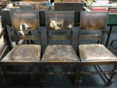 Six oak dining chairs upholstered with buttoned leather