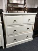 A painted pine four drawer chest