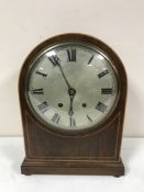 A Victorian inlaid mahogany dome topped clock