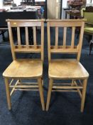 A pair of church chairs