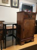 An inlaid yew wood cabinet and a plant stand