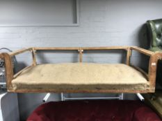 An antique pine settee frame