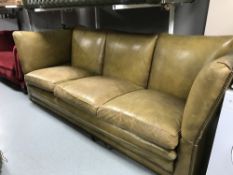 A tan leather three seater drop end settee (for restoration)
