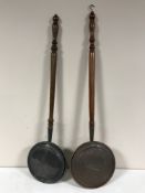 Two copper bed warming pans