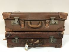 Two vintage leather luggage cases