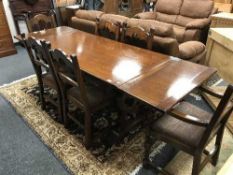 A good quality Bevan Funnel oak eight piece oak dining room suite comprising of pull-out dining