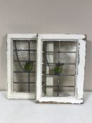 Eleven leaded stained glass windows in frames