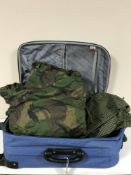 Two suitcases containing a large quantity of army DP clothing
