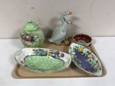 A china pottery figure of a duck and four pieces of Maling lustre ware