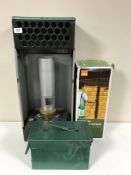 A vintage green house heater,