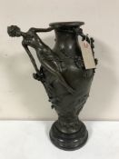 A bronze vase on marble socle with maiden and branch decoration, height 38.