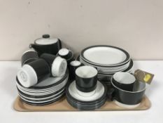 A tray containing a forty-two piece Poole pottery tea and dinner service