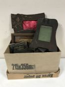A box of assorted early 20th century oak and copper picture frames