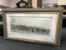 A large gilt-framed print entitled 