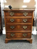 A good quality burr walnut chest of four drawers,