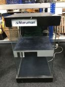 A Maruman counter top display cabinet