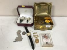A tin of Free Masons badge, fob, watches, pen knife, Legends & Lyrics miniature book,
