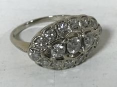 A Victorian oval shaped diamond cluster ring, 4.1g, size I.