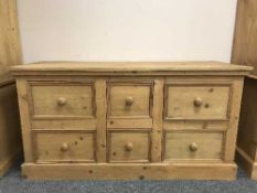 A pine six drawer block chest
