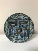 A Troika wheel mask vase,